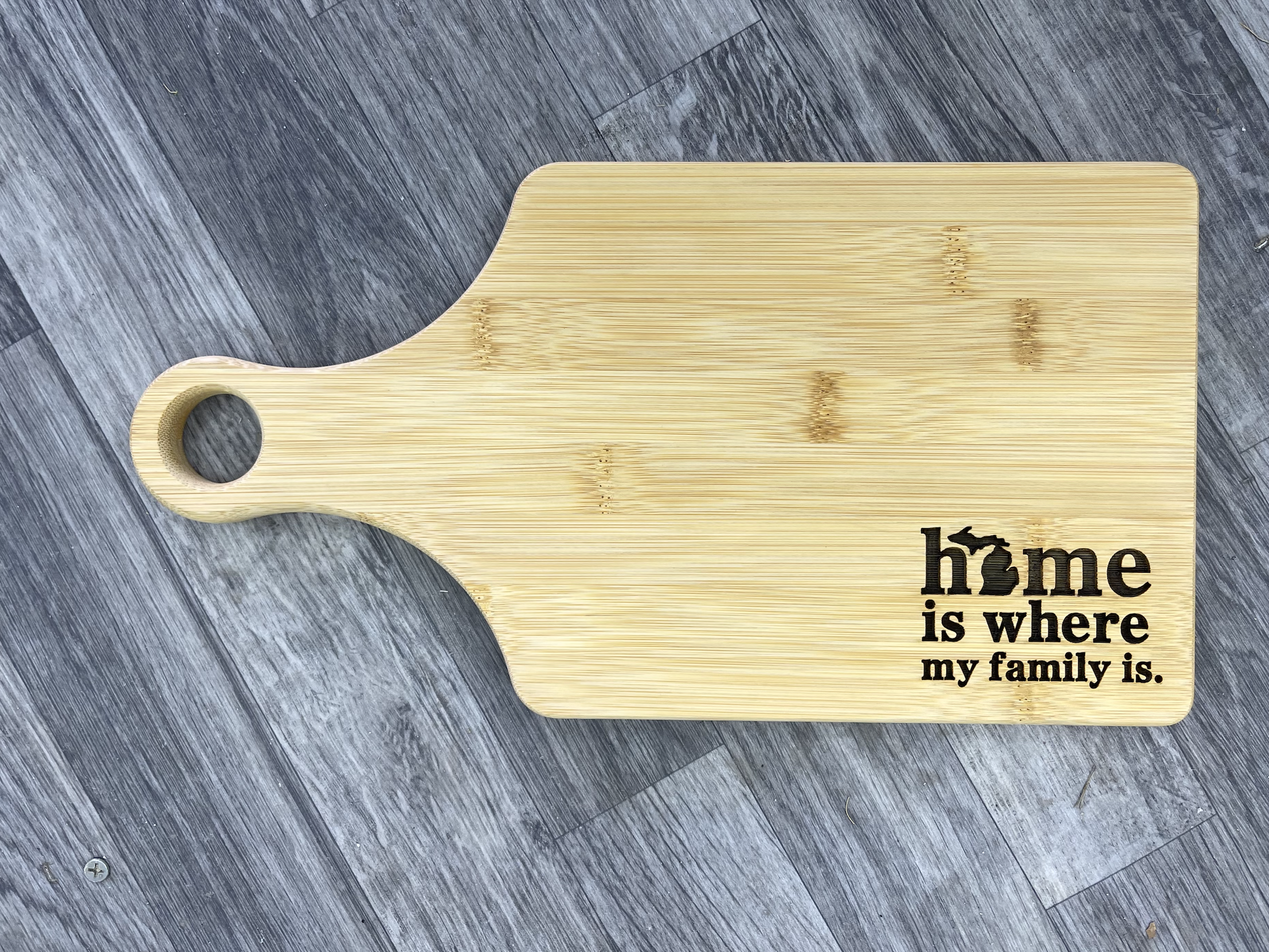 "Home Is Where My Family Is." Small Wooden Engraved Cutting Board